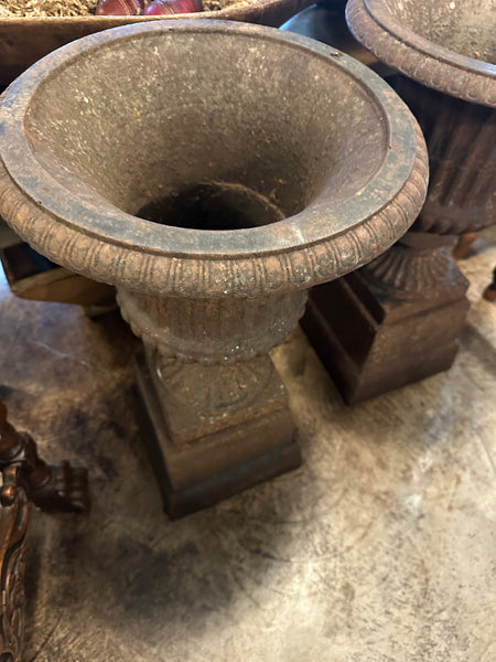 Pair of Cast Iron Urns on Plinths