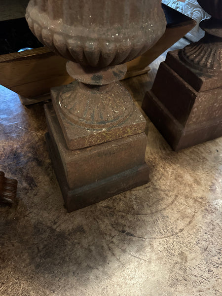 Pair of Cast Iron Urns on Plinths