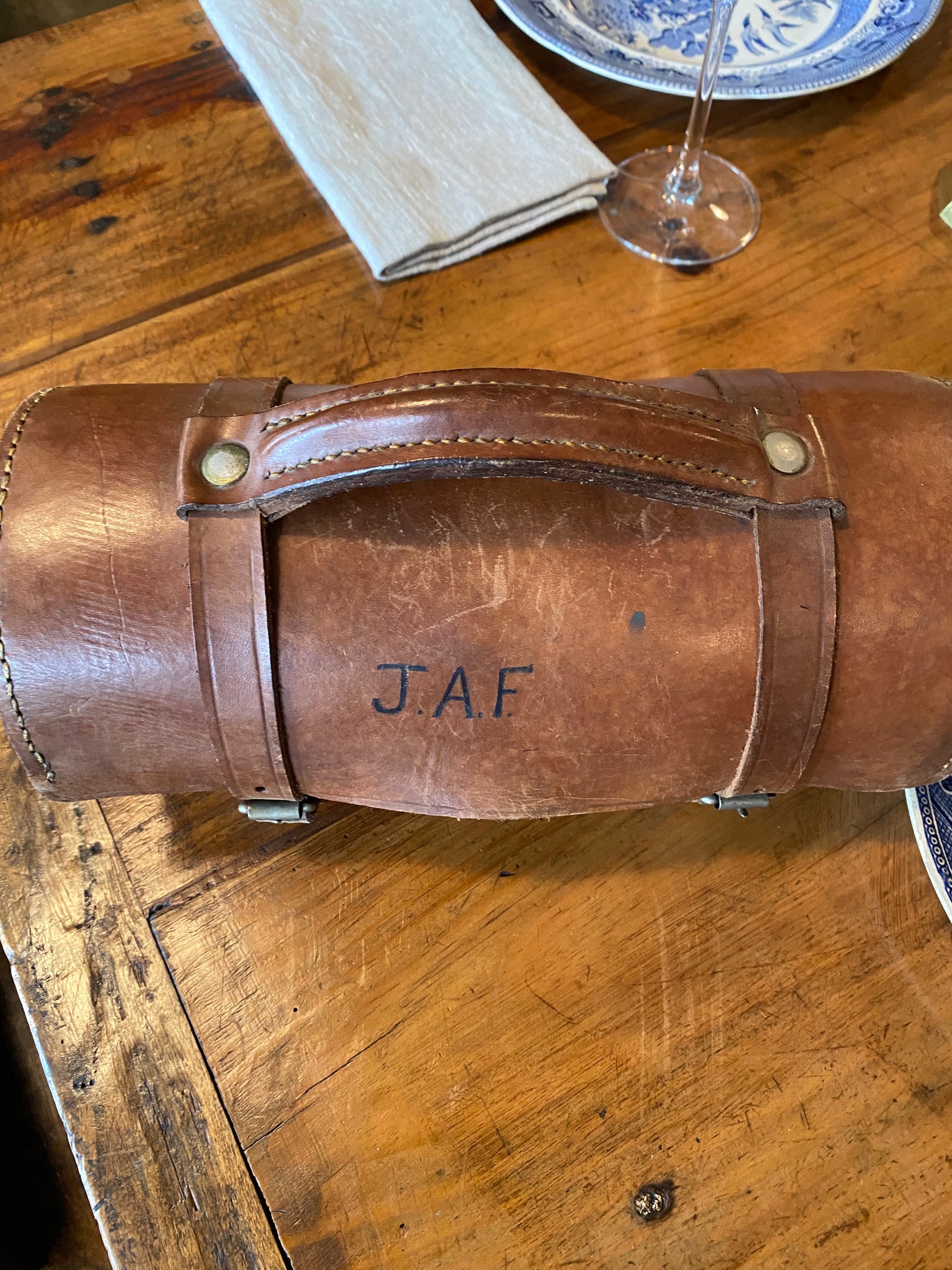Two Lawn Bowls in a Leather Case