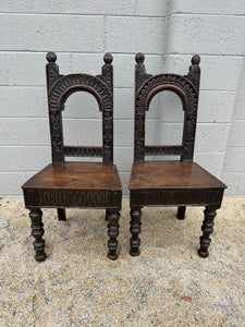 Pair of Carved Oak Hall Chairs